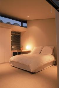 Ліжко або ліжка в номері Lion's View Villa & Apartment