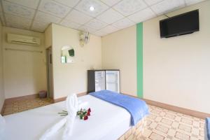 TV a/nebo společenská místnost v ubytování Mukda Guesthouse