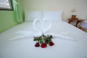 Postel nebo postele na pokoji v ubytování Mukda Guesthouse