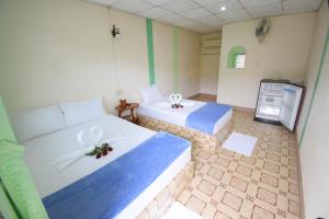 Postel nebo postele na pokoji v ubytování Mukda Guesthouse