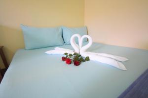 Postel nebo postele na pokoji v ubytování Mukda Guesthouse