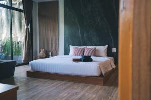 Postel nebo postele na pokoji v ubytování Veravian Resort