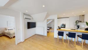 Kuchyň nebo kuchyňský kout v ubytování Lieblingsplatz Neusiedl Appartement - Erhol dich gut