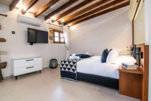 A bed or beds in a room at Casa Bene