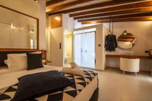 A bed or beds in a room at Casa Bene