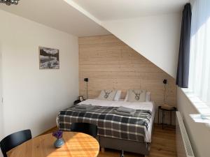 Posteľ alebo postele v izbe v ubytovaní Apartmán Bambi Kvilda
