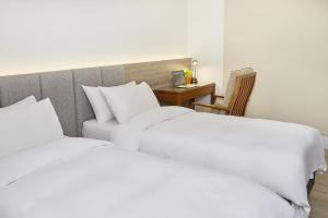 Postel nebo postele na pokoji v ubytování Hotel Z