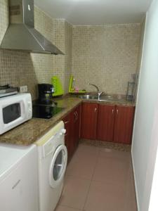 Kuchyňa alebo kuchynka v ubytovaní NERJA APARTAMENTO TURISTICO 2B