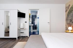 Postel nebo postele na pokoji v ubytování Francis Superior Rooms
