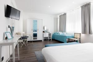 Postel nebo postele na pokoji v ubytování Francis Superior Rooms