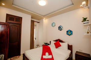Letto o letti in una camera di Conico Đà Lạt Hotel