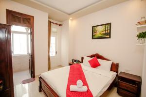 Letto o letti in una camera di Conico Đà Lạt Hotel