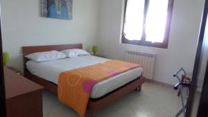 Postel nebo postele na pokoji v ubytování B&B La Posada Stintino
