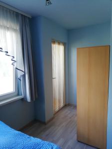 A bed or beds in a room at Wohnung