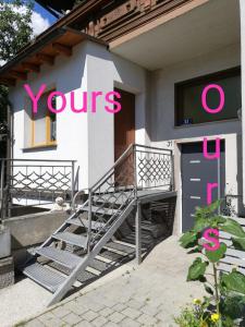 a house with a sign that says yours at Wohnung in Pöttsching