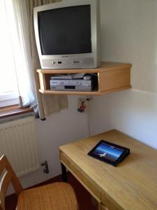 A television and/or entertainment centre at Apartment in Seefeld in Tirol