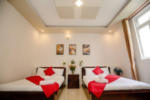 Letto o letti in una camera di Conico Đà Lạt Hotel