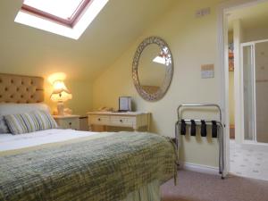 Uma cama ou camas num quarto em Crystal Springs B&B