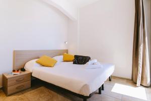 Posteľ alebo postele v izbe v ubytovaní Hotel Jolly Roger