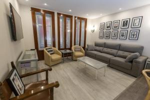 TV a/nebo společenská místnost v ubytování Espacioso Apartamento a estrenar!! Casco Viejo