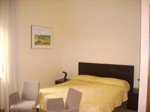 Cama o camas de una habitación en Palazzo Serraino