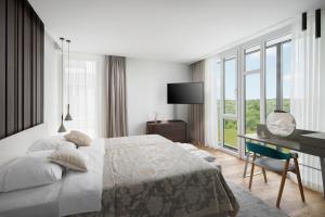 Posteľ alebo postele v izbe v ubytovaní Design Villa Noble with Spa + 37 fotografií