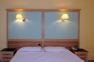 Postel nebo postele na pokoji v ubytování Park Hotel