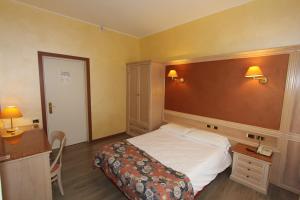Postel nebo postele na pokoji v ubytování Park Hotel