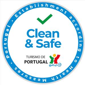 a blue clean and safe logo with a green tick at Hotel Rural de Charme Maria da Fonte in Póvoa de Lanhoso