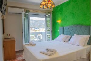Katil atau katil-katil dalam bilik di Hotel Astoria