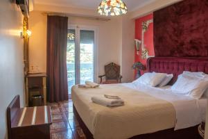 Katil atau katil-katil dalam bilik di Hotel Astoria