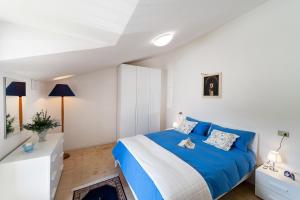 A bed or beds in a room at Agriturismo Podere Coldifico