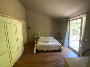 Voodi või voodid majutusasutuse Hotel Edoné toas