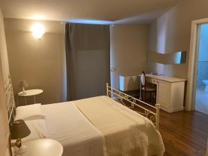 Voodi või voodid majutusasutuse Hotel Edoné toas