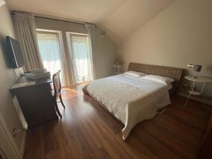 Voodi või voodid majutusasutuse Hotel Edoné toas