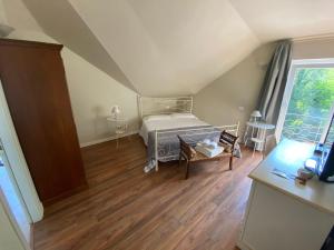 Voodi või voodid majutusasutuse Hotel Edoné toas