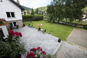 an aerial view of a patio with tables and chairs at Rudy Lis Szczyrk in Szczyrk