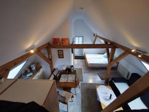 an overhead view of a living room with an attic at Loft auf dem Land in Ludwigslust