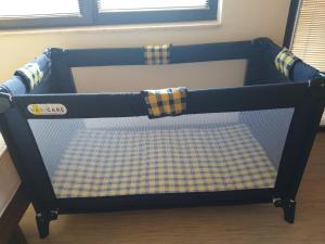 A bed or beds in a room at Apartament Emi