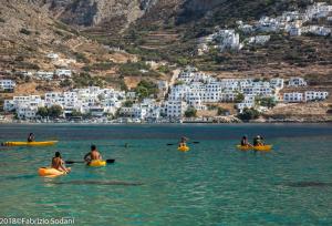 a group of people in kayaks in a body of water at Aegeon Pension in Aegiali