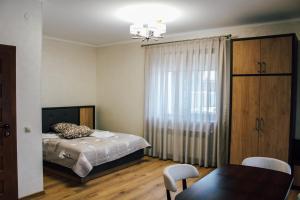 Postel nebo postele na pokoji v ubytování HOTEL Баймонт
