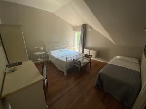 Voodi või voodid majutusasutuse Hotel Edoné toas