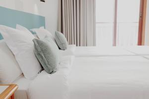 Postel nebo postele na pokoji v ubytování Hotel Castillete