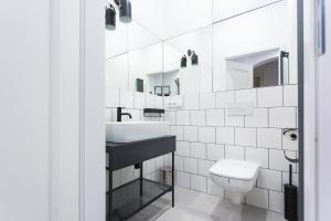 Kúpeľňa v ubytovaní Apartamenty Teatralna + 4 fotografie