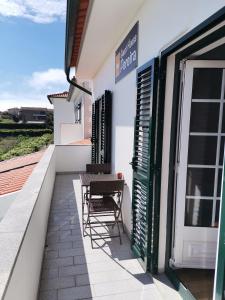 Balkón nebo terasa v ubytování Guest House Pereira + 37 fotografií