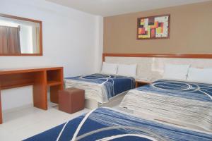 Postel nebo postele na pokoji v ubytování Hotel Niza Zona Piel + 37 fotografií
