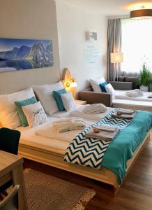 Postel nebo postele na pokoji v ubytování Apartment Goisernperle