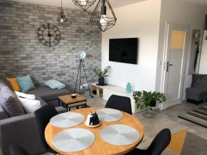 TV a/nebo společenská místnost v ubytování Apartamenty Garden
