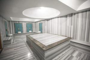 Postel nebo postele na pokoji v ubytování Lidya Hotel