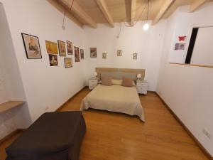 Postel nebo postele na pokoji v ubytování Arco Della Neve Guest House